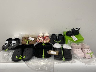 Lot 9x Pairs of Crocs in various styles and sizes