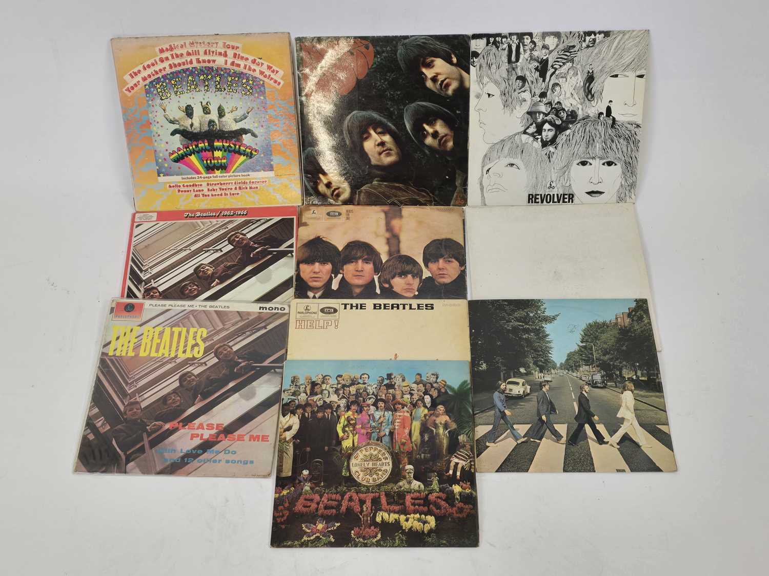 Lot A group of The Beatles albums including...