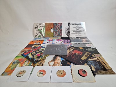 Lot A box of vinyl albums including Taylor Swift...