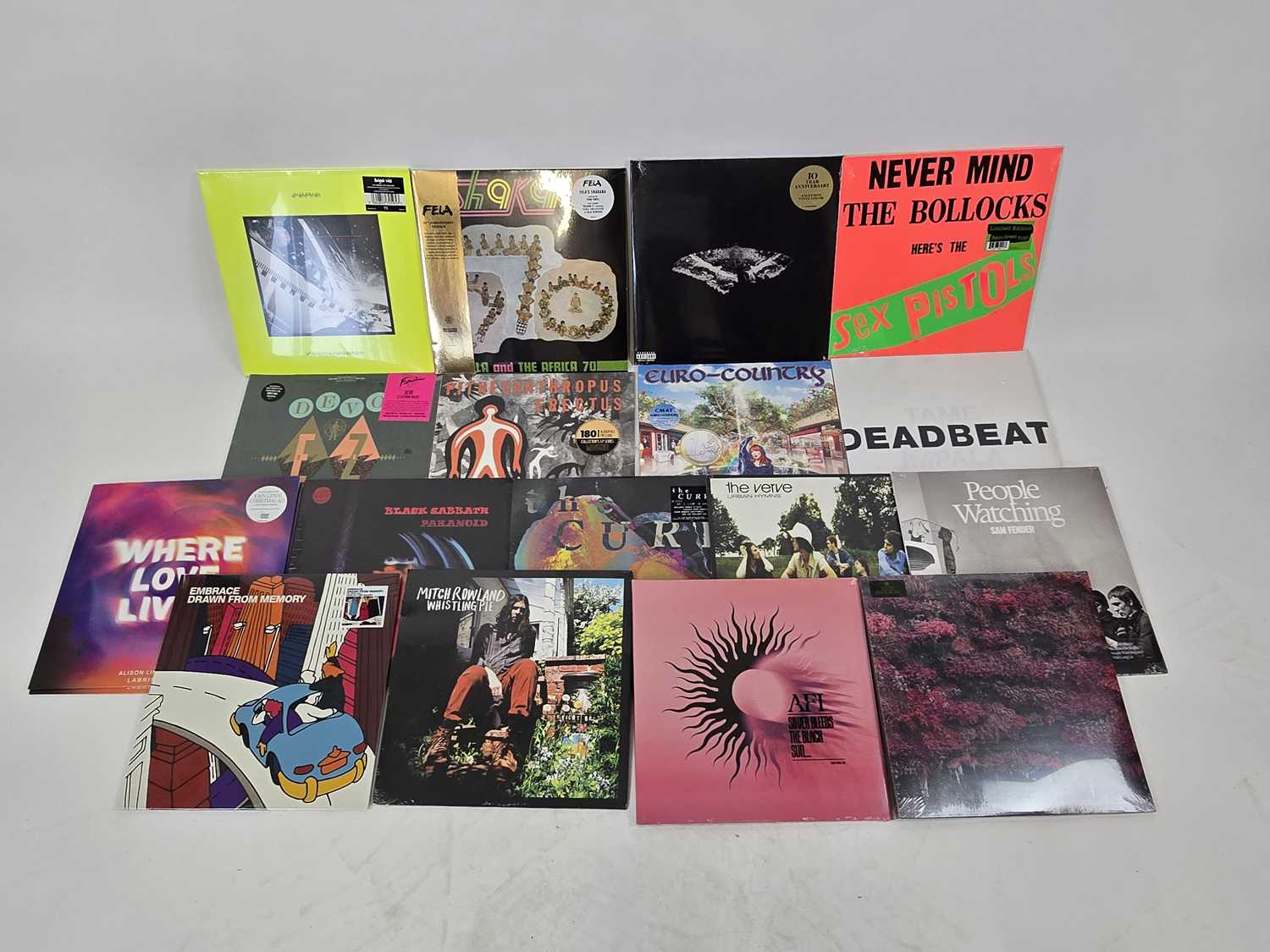 Lot A box of sealed vinyl albums including The...