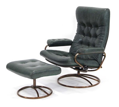 Lot 194 - A Norwegian reclining armchair with green...