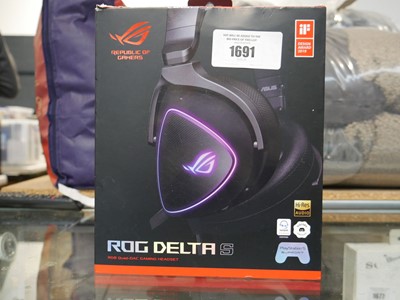 Lot 1691 - Boxed pair of RGB Quad Dock DAC gaming headset