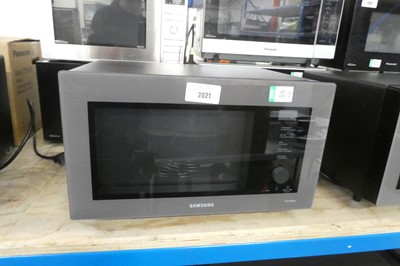 Lot 2021 - Boxed Samsung combination microwave oven...