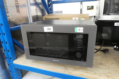 Lot 2023 - Boxed Samsung combination microwave oven...