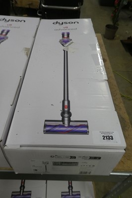 Lot 2133 - Boxed Dyson V8 Advanced cordless stick vacuum...