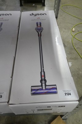 Lot 2134 - Boxed Dyson V8 Advanced cordless stick vacuum...