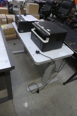 Lot 2158 - Tresanti glass top electric height adjustable...