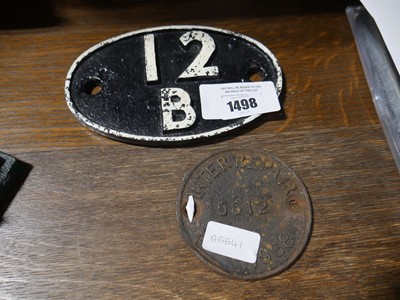 Lot 1498 - Black and white cast iron railway sign, '12B'...