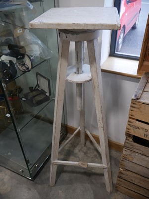 Lot 1509 - White painted revolving stand