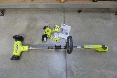 Lot 2377 - Ryobi cordless 2 wheel garden brush cutter...