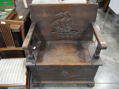 Lot 1526 - Dark oak single seater monk's bench