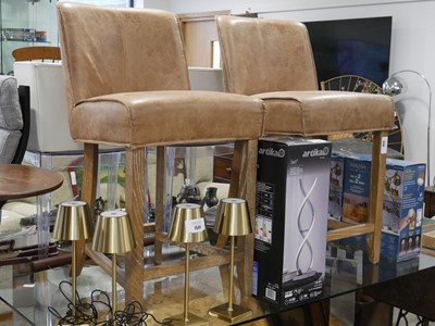 Lot 1540 - Pair of tan leather upholstered bar height...