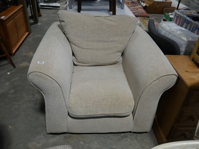 Lot 1570 - Beige fabric upholstered armchair