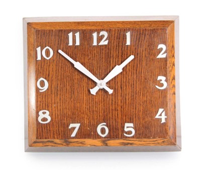 Lot 214 - A 1950's Smiths oak wall clock, the square...
