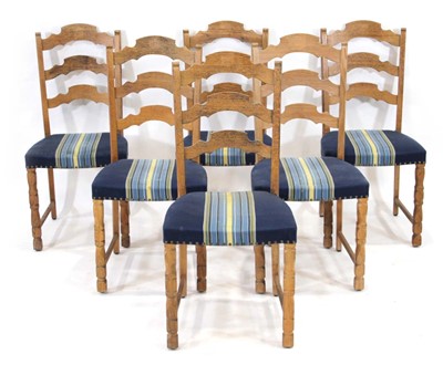 Lot 244 - A set of six Danish oak ladder-back dining...