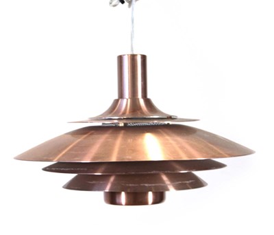 Lot 143 - A Danish four-tier copper finished ceiling...