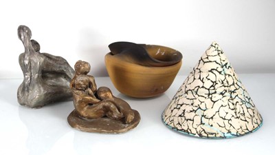 Lot 197 - A figural group in the style of Henry Moore...