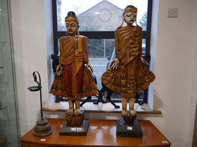 Lot 1006 - Pair of decoratively painted Indonesian figures