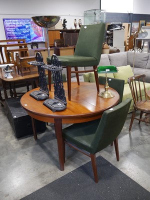 Lot 1028 - Mid-century teak circular extending dining...