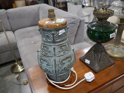Lot 1037 - Decorative metal table lamp on wooden stands