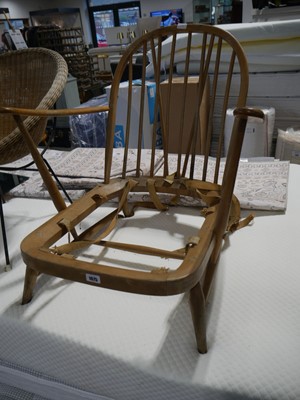 Lot 1075 - Blonde Ercol easy chair frame in need of...