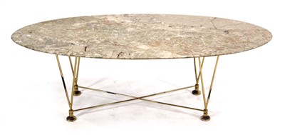 Lot 253 - A 1970's marble coffee table, the oval surface...
