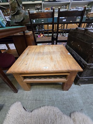 Lot 118 - A distressed square top occasional table with...