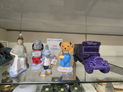 Lot 330 - A boxed Wade Arthur Hare figurine with three...