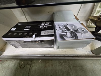 Lot 343 - Two boxed sets of stainless steel cooking pans...