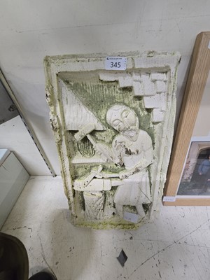 Lot 345 - A plaster relief of a blacksmith