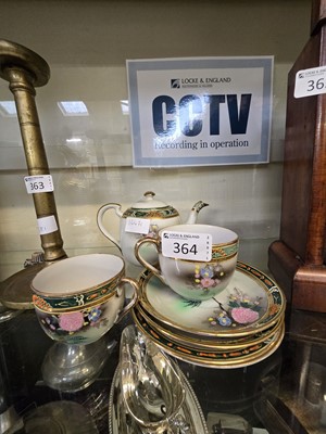 Lot 364 - A two place Japanese ceramic tea set with...