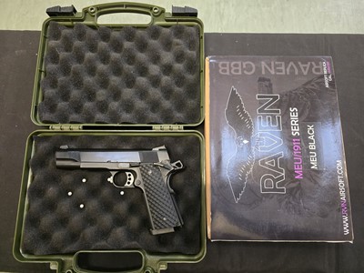 Lot 423 - A cased Raven Airsoft pistol in the form of...