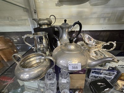 Lot 366 - An assortment of metal ware to include pewter...