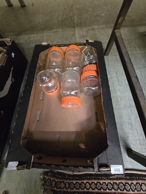 Lot 448 - A tray containing six glass Kilner jars