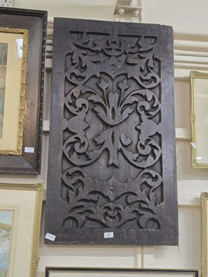 Lot 41 - Carved oak panel with floral decoration