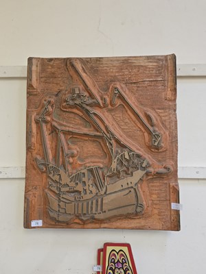 Lot 78 - A wall mounted engraving plate with boat design