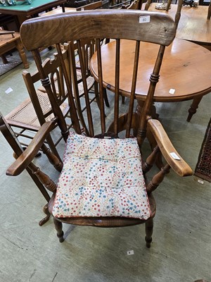 Lot 80 - A mahogany spindle back open armchair on...