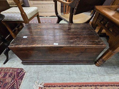 Lot 100 - A stained pine travelling trunk