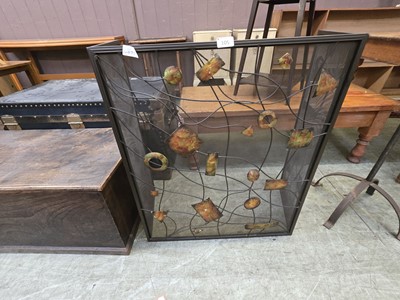 Lot 105 - A modern cast metal spark guard with applied...