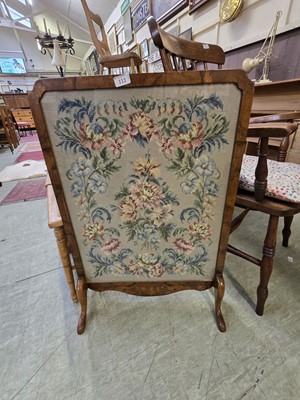 Lot 111 - A walnut veneered glazed fire screen with...