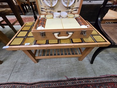 Lot 135 - A mid-20th century style rectangular tile top...