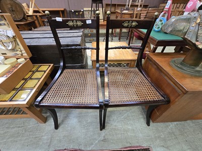 Lot 137 - A pair of stained wooden cane seated Regency...