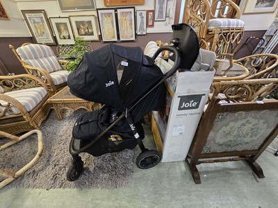Lot 144 - A Joie pushchair along with a boxed highchair