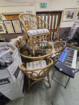 Lot 146 - A glass topped bamboo and wicker circular...