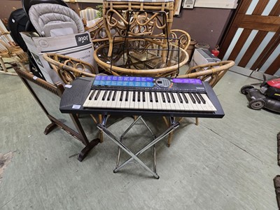Lot 147 - A Yamaha PSR-73 keyboard with stand (A/F, no PSU)