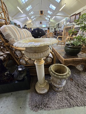 Lot 150 - A white painted metalwork planter on Roman...