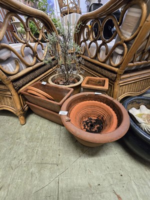 Lot 153 - An assortment of garden pots to include...