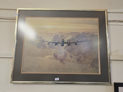 Lot 173 - A framed and glazed print of Lancaster Bomber...