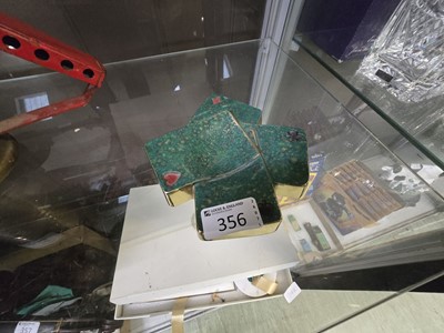 Lot 356 - A green metal pin dish moulded as four playing...