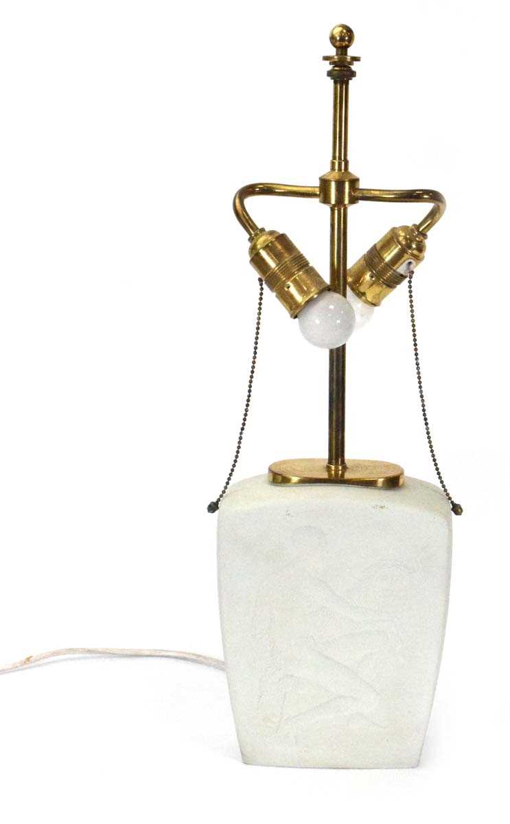 Lot 63 - A German brass and stoneware table lamp by KPM...